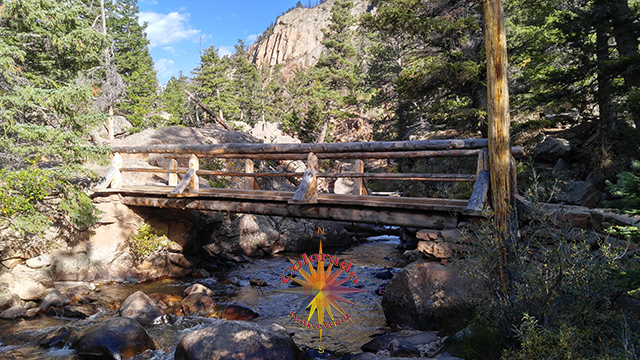 Foot bridge crossing the Big Thompson River at the Pool, Fern Lake Trail, at the junction you could make it a loop hike to Cub Lake or go right up to Fern Lake, Rocky Mountain National Park, Colorado