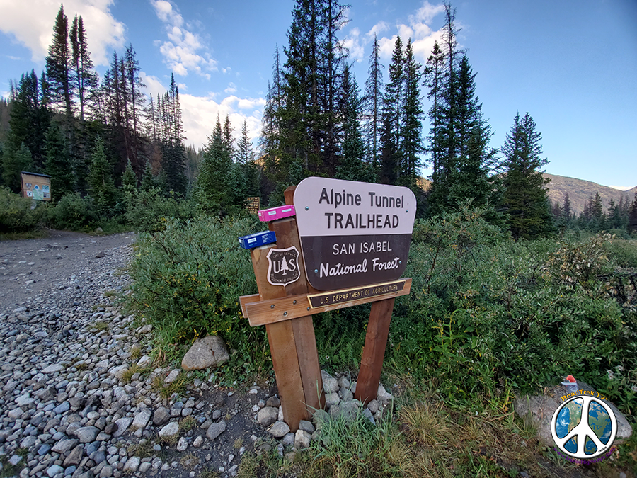 Alpine Trail head sign displaying some RXBars, my favorite protein bar, you can to Alpine Tunnel, Tunnel Lake, Tin Cup Pass to the north or south on to Hancock lakes, Chalk Pass and on to Monarch Pass