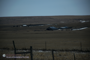 Homesteads nestled in the coulee's out of the wind out on the prairie as we head south